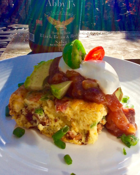 Abby J's Mexican Egg & Chorizo Casserole topped with Abby J's Bean & Herb Salsa